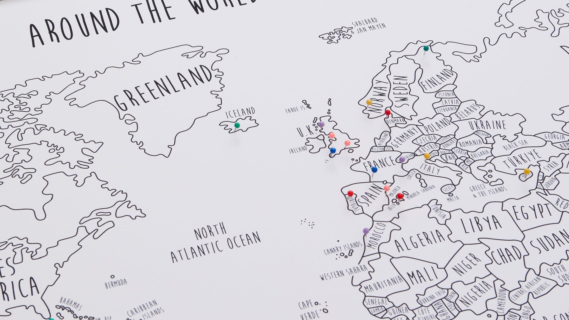 World map with travel markers and text 'Around the world with the Baxter Family' on a light blue background.